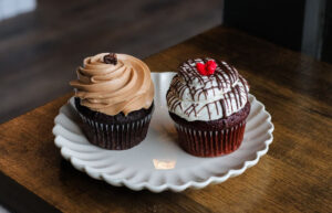 Assorted gourmet cupcakes at Ann Arbor Bakehouse 46, showcasing top-notch quality and creativity.